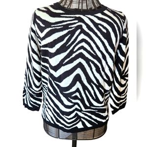 ANN TAYLOR  SIZE XL zebra print sweater. Dry clean only.